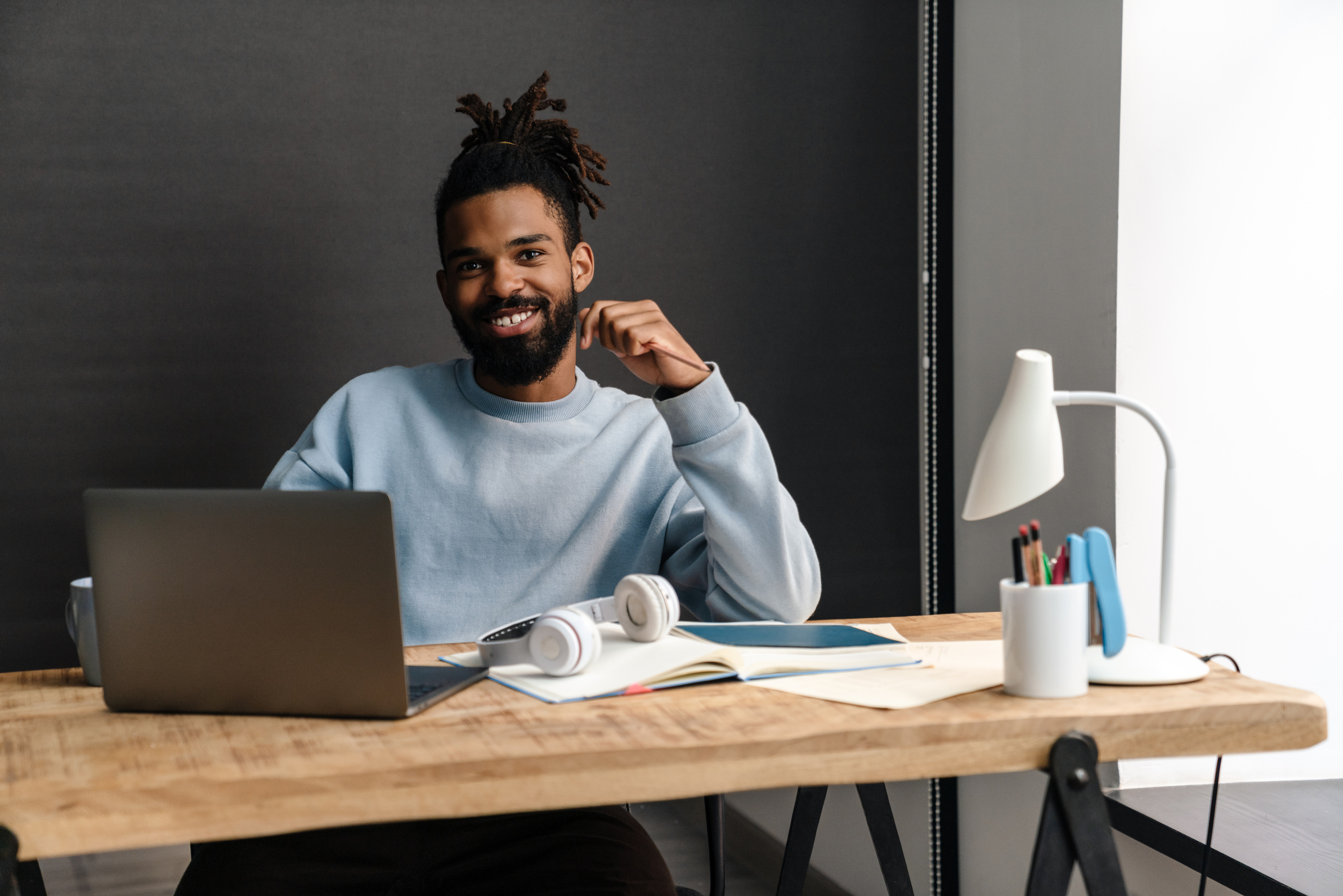 Confident Young African Man Freelancer Working